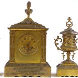 A 19th century French gilt-bronze cased 3-piece clock garniture, surmounted by a bust of a woman,