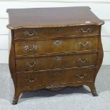 A 19th century Dutch mahogany bombe chest of 4 drawers, with brass handles and mounts, width 2'9",