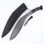 A Second War Period Gurkha kukri knife, original leather scabbard, missing one small knife