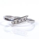 A 9ct white gold 5-stone diamond crossover ring, total diamond content approx 0.15ct, setting height