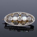 A Belle Epoque style unmarked gold opal and diamond oval brooch, with openwork settings, length 28.