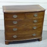 A George III mahogany bow-front chest of 3 long and 2 short drawers, with cross-banded top and