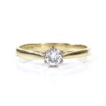 An 18ct gold 0.2ct solitaire diamond ring, size L, 2.3g