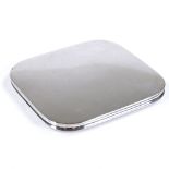 An Art Deco Asprey's silver cigarette case, of rounded-edge square form with gilt interior,