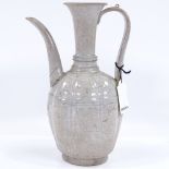 A Chinese white glaze porcelain ewer, collection label under base, height 28cm