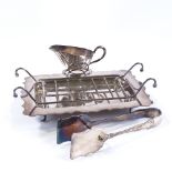 An electroplate asparagus serving dish, with matching sauce boat and serving tongs