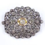 A Georgian silver yellow stone and paste brooch, pierced closed back settings, brooch length 49.6mm,