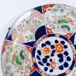 A large Chinese porcelain charger with hand painted decoration, diameter 45cm
