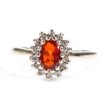 A 9ct gold fire opal and diamond cluster ring, setting height 9.9mm, size L, 2.1g