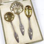 A 19th century French silver strawberries and cream set, comprising strawberry spoon, cream ladle,