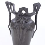 An Art Nouveau spelter vase, probably WMF, with relief moulded decoration, no factory marks,