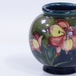A Moorcroft Clematis pattern vase, height 13cm
