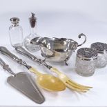 Various silverware, including gravy boat, fox head tot bottle, salad servers etc