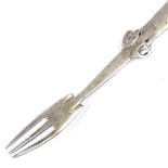 A rare Liberty & Co Cymric silver fork, designed by Archibald Knox, the stem cast with a Celtic