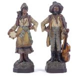 A pair of 19th century Continental terracotta figures, with painted decoration, impressed maker's
