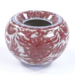 A Chinese porcelain brush pot with painted iron-red floral designs, 6 character mark, overall
