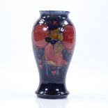 A Moorcroft Pomegranate design vase, height 18cm