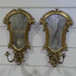 A pair of Italian carved giltwood-framed girandole wall mirrors, with candle brackets, height 22"