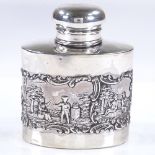 A late Victorian oval silver tea caddy, with relief embossed lover scenes, by Levi & Salaman,