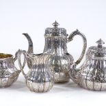 A fine quality Victorian 4-piece silver tea and coffee set, with engraved and relief embossed