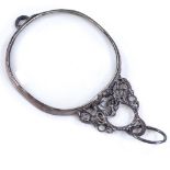 A 1970s silver-mounted magnifying glass, with openwork stylised settings, maker's marks GB,
