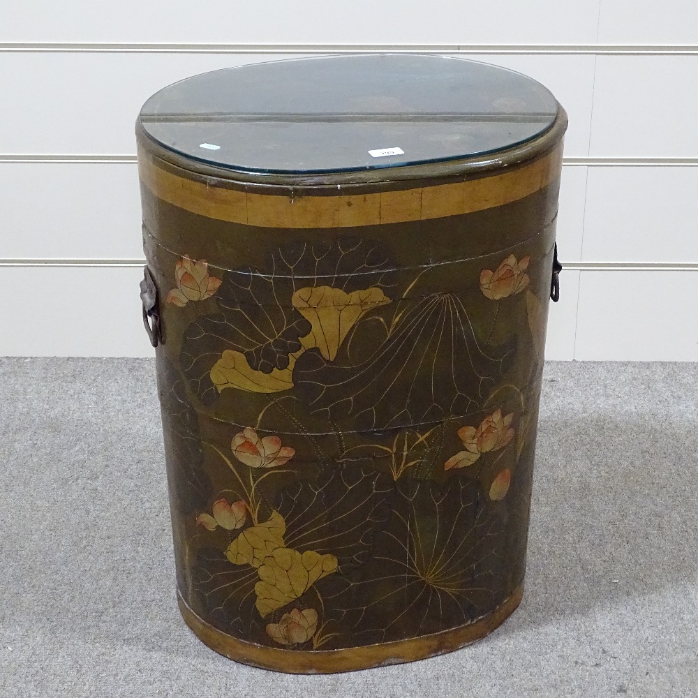 An Oriental lacquer barrel-shaped cabinet, with lift-up top, width 21", height 2'4"