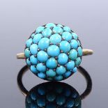 An unmarked gold cabochon turquoise bombe panel ring, Continental silver-gilt backing, panel