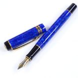 A Parker Duofold fountain pen, blue lacquer barrel with 18ct gold nib, boxed