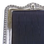 A modern large Britannia standard silver-fronted photo frame, with fluted border, by Paul Vernon