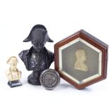 A framed wax cameo portrait bust of Napoleon Bonaparte, a spelter bust of Napoleon, height 18cm, a