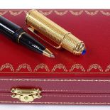 A Cartier Pasha De Cartier ballpoint pen, boxed with papers