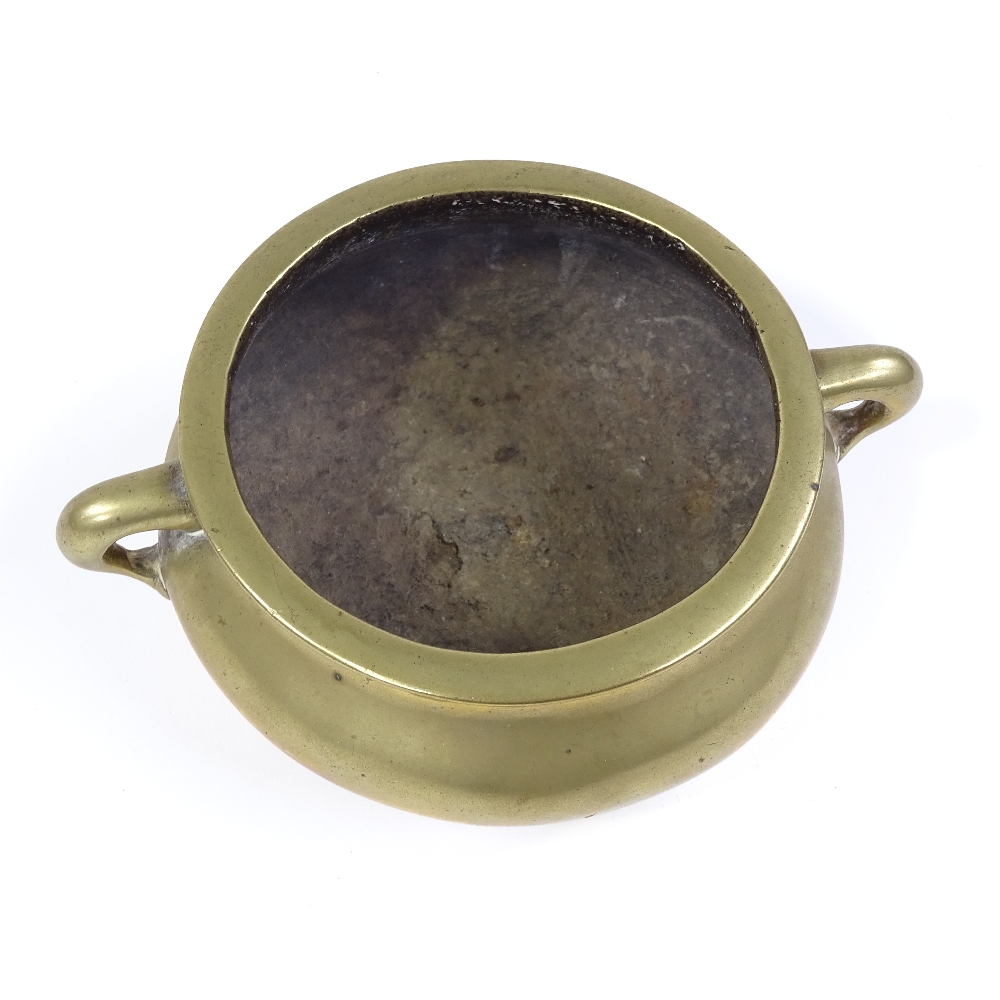 A Chinese bronze 2-handled censer, impressed 6 character seal mark under base, rim diameter 12cm, - Image 3 of 9