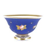 A Paris porcelain tea bowl, circa 1810, painted and gilded decoration on blue ground, diameter 9cm