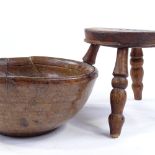 A rustic turned wood bowl, diameter 25cm, and a small elm stool (2)