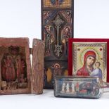 A group of modern ornaments, including a North African religious painted wood panel, a carved and