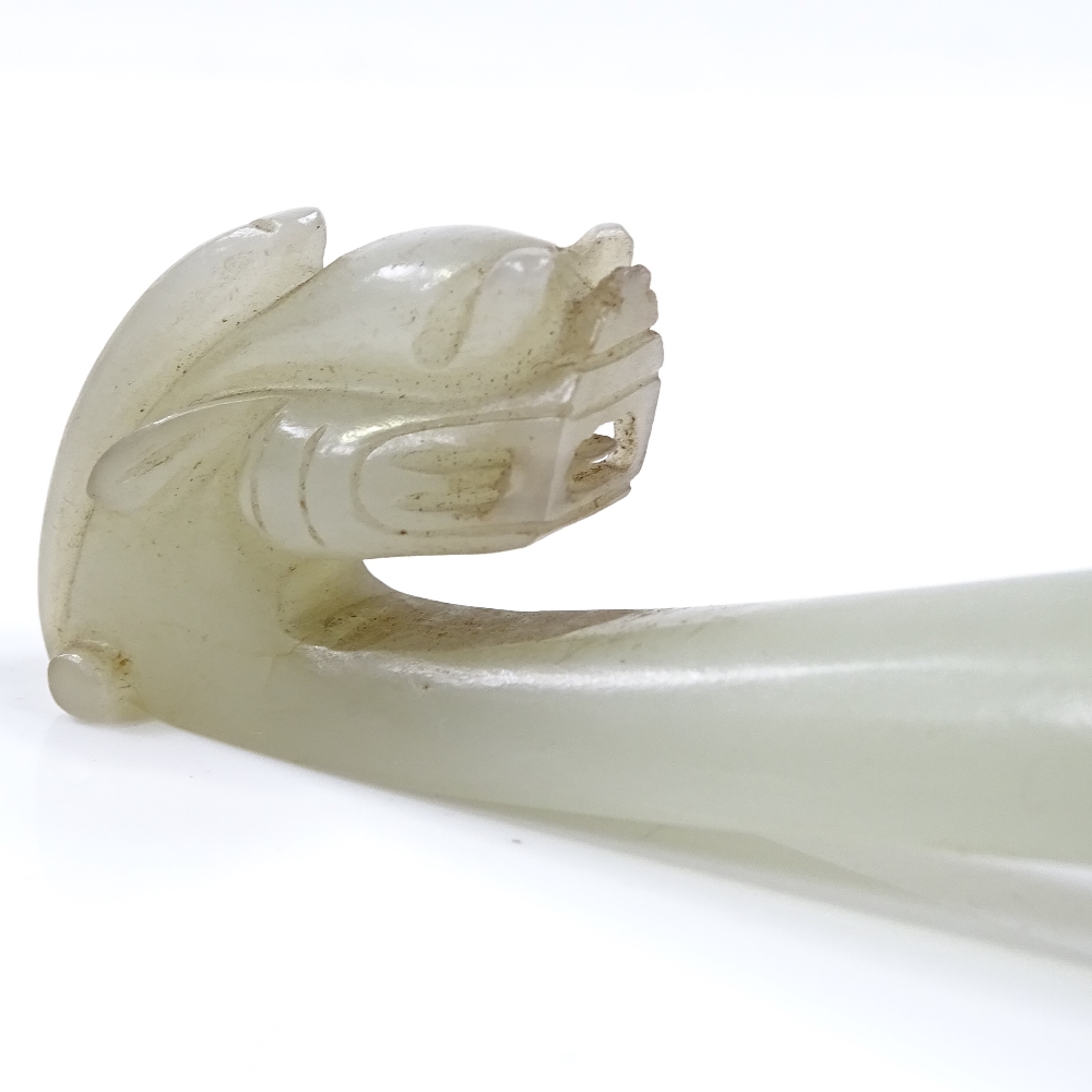 A Chinese carved jade dragon design buckle, length 9.5cm - Image 2 of 3