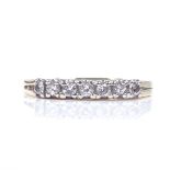 An 18ct gold 7-stone diamond half-hoop ring, setting height 2.8mm, size O, 3g