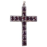 An unmarked white metal garnet cross pendant, height excluding bale 82.6mm, 16.9g
