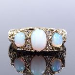 A 9ct gold 7-stone opal and diamond half-hoop ring, with foliate carved bridge and shoulders,