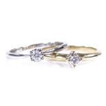 2 9ct gold solitaire diamond rings, largest diamond approx 0.1ct, both size M, 3g (2)