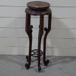 A Chinese hardwood jardiniere stand, with relief carved decoration on 5 legs, height 3'8"