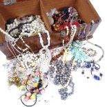 A large group of various costume jewellery, beads etc