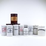 A collection of ceramic and metal apothecary jars (12)