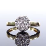 An 18ct gold diamond cluster flowerhead ring, setting height 8.3mm, size N, 3.8g