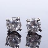 A pair of 18ct white gold 0.4ct solitaire diamond earrings, with stud fittings, each stone approx