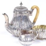A Victorian silver 3-piece batchelor's tea set, of baluster form, with all over relief embossed