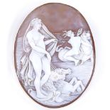 A relief carved cameo panel brooch, depicting Classical figures with horses, in 18ct gold frame,