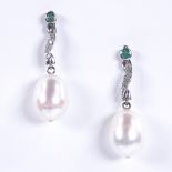 A pair of unmarked white gold pearl emerald and diamond drop earrings, with stud fittings, earring