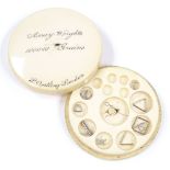 A Victorian ivory-cased set of assay weights, by Oertling of London, diameter 6cm
