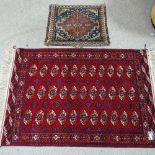 A Tekke Turkoman rug 147cm x 105cm, and a Persian bagface 72cm x 61cm (2)